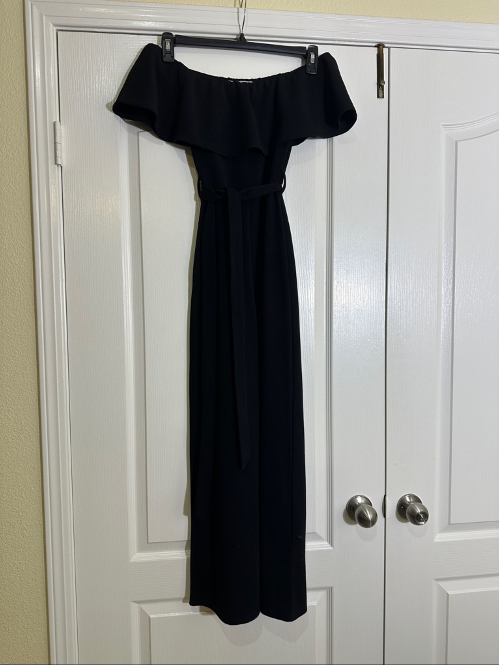 Almost Famous Off-Shoulder Black Jumpsuit with Waist Tie and elastic waist. XS